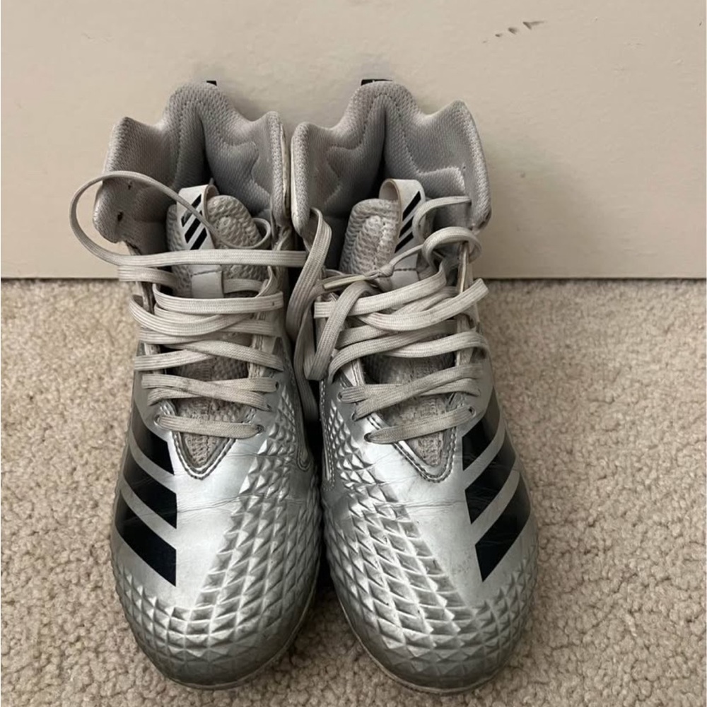 Silver Adidas Soccer Cleats with Black Accents